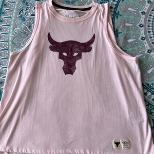 The rock under Armour women’s pink tank top